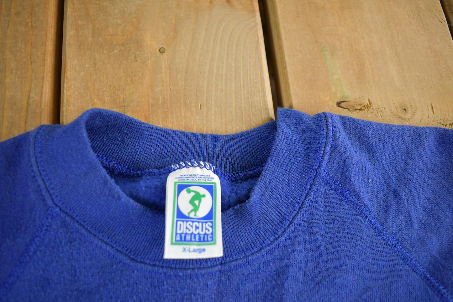 Vintage 1990s Discus Athletic Blank Blue Crewneck Sweatshirt Men's Large from propervintagecanada