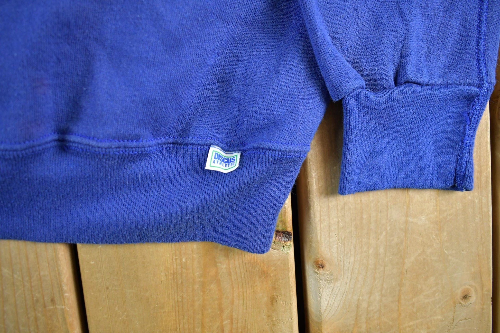 Vintage 1990s Discus Athletic Blank Blue Crewneck Sweatshirt Men's Large from propervintagecanada