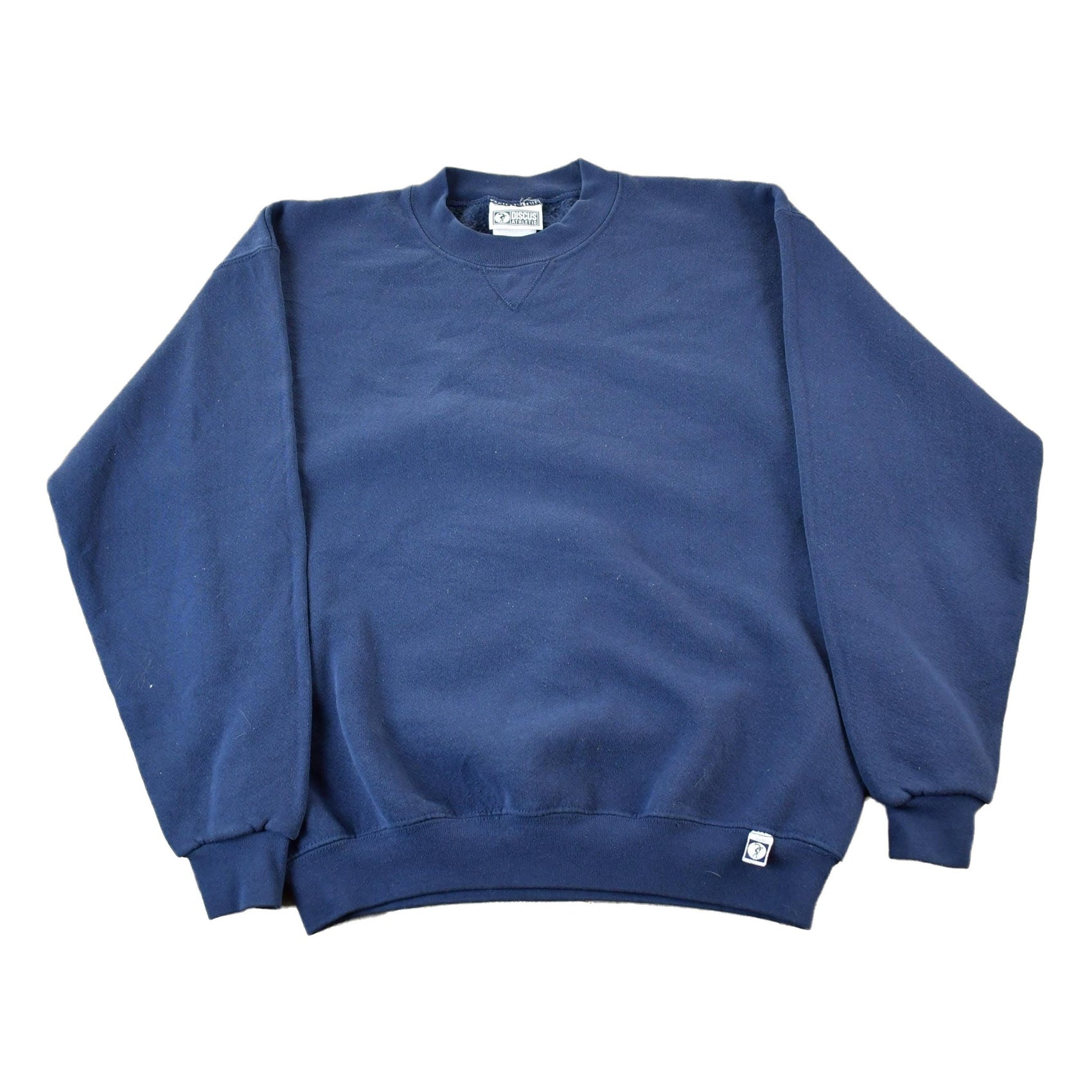 Vintage 1990s Discus Athletic Blank Blue Crewneck Sweatshirt Men's Medium from propervintagecanada