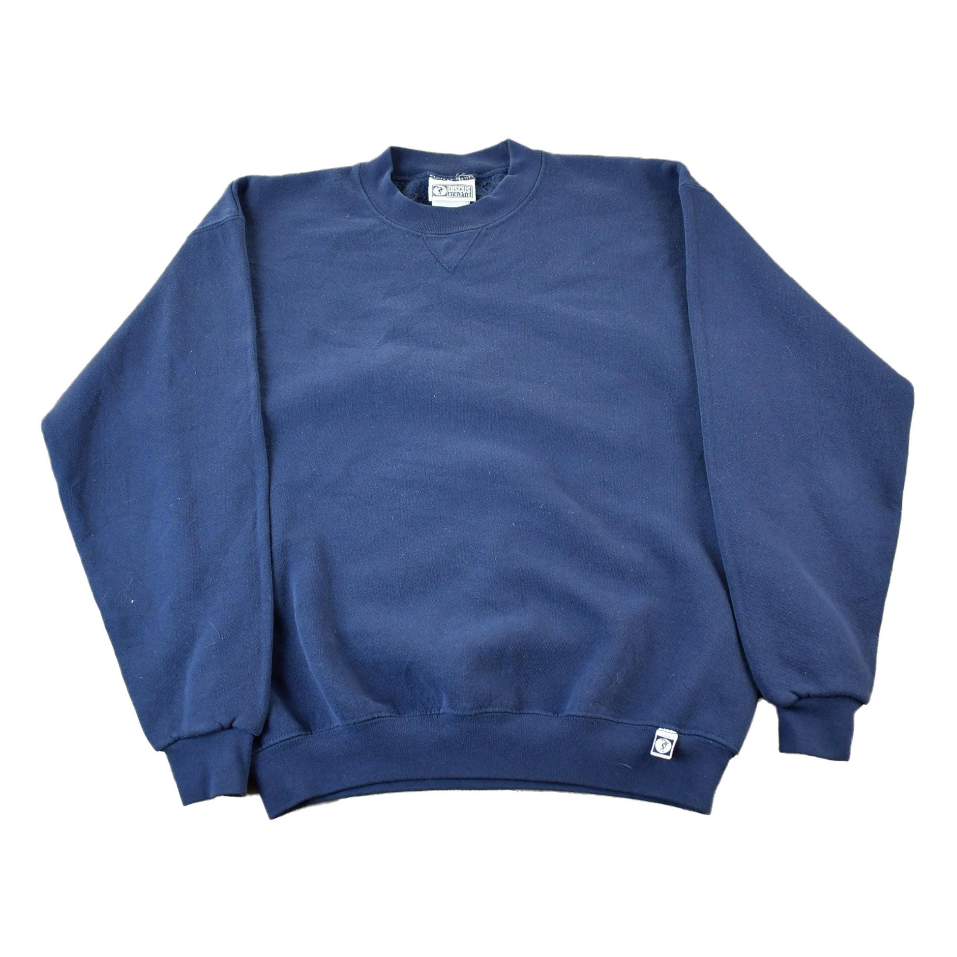Vintage 1990s Discus Athletic Blank Blue Crewneck Sweatshirt Men's Medium from propervintagecanada