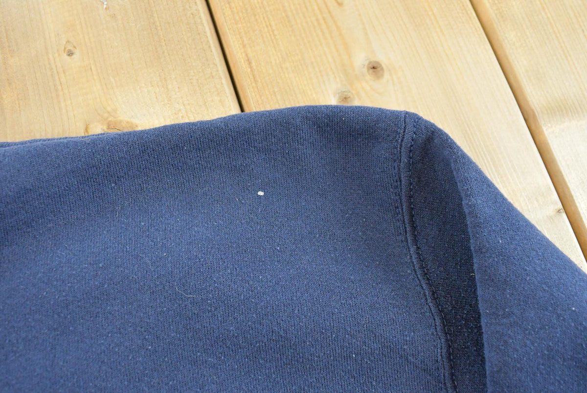Vintage 1990s Discus Athletics Made In USA Basic Blank Blue Crewneck Sweatshirt Men's M from propervintagecanada