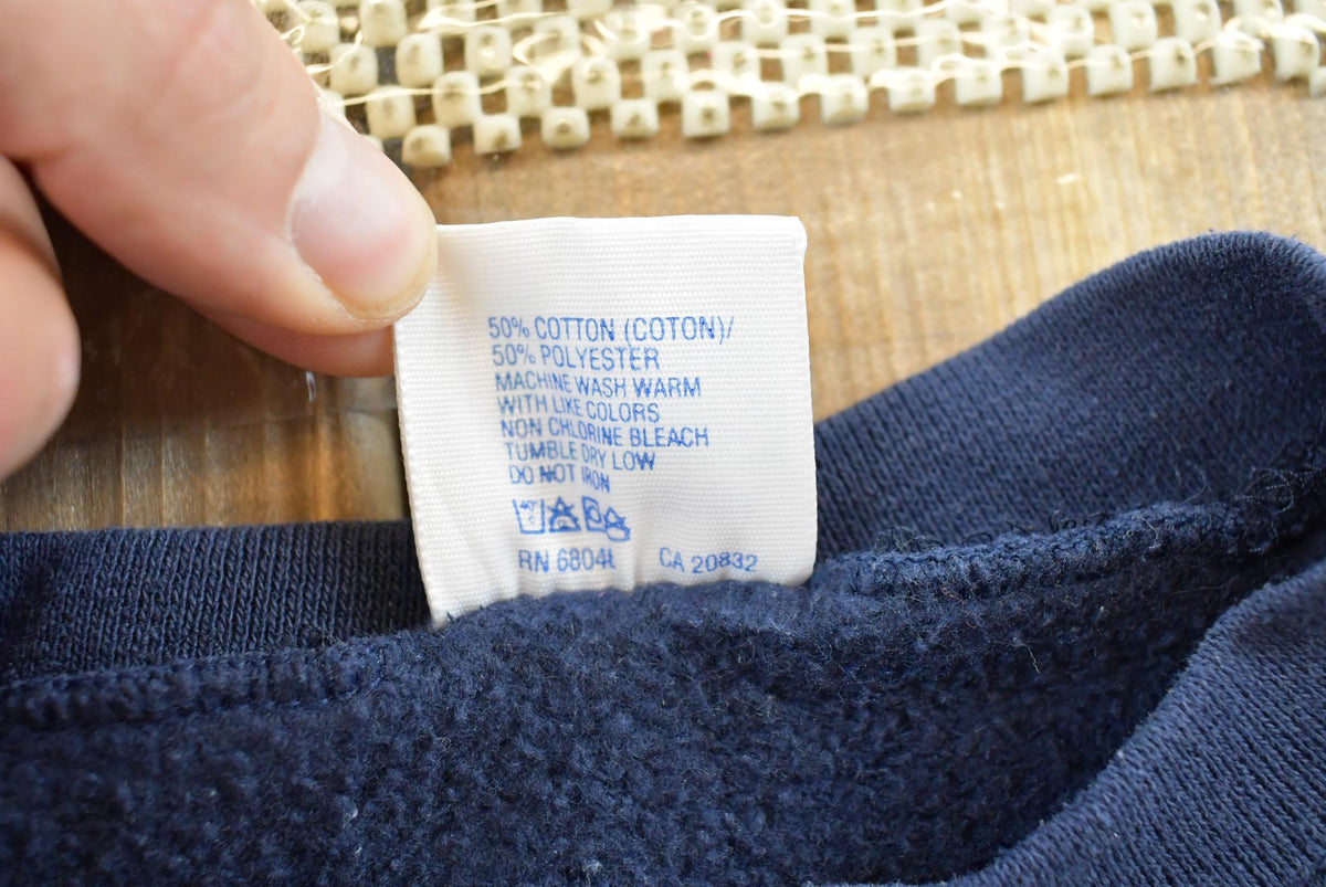 Vintage 1990s Discus Athletics Made In USA Basic Blank Blue Crewneck Sweatshirt Men's M from propervintagecanada