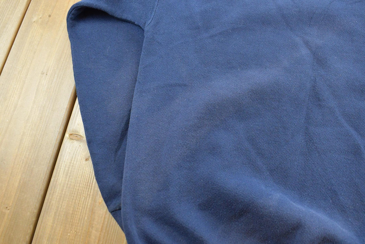 Vintage 1990s Discus Athletics Made In USA Basic Blank Blue Crewneck Sweatshirt Men's M from propervintagecanada