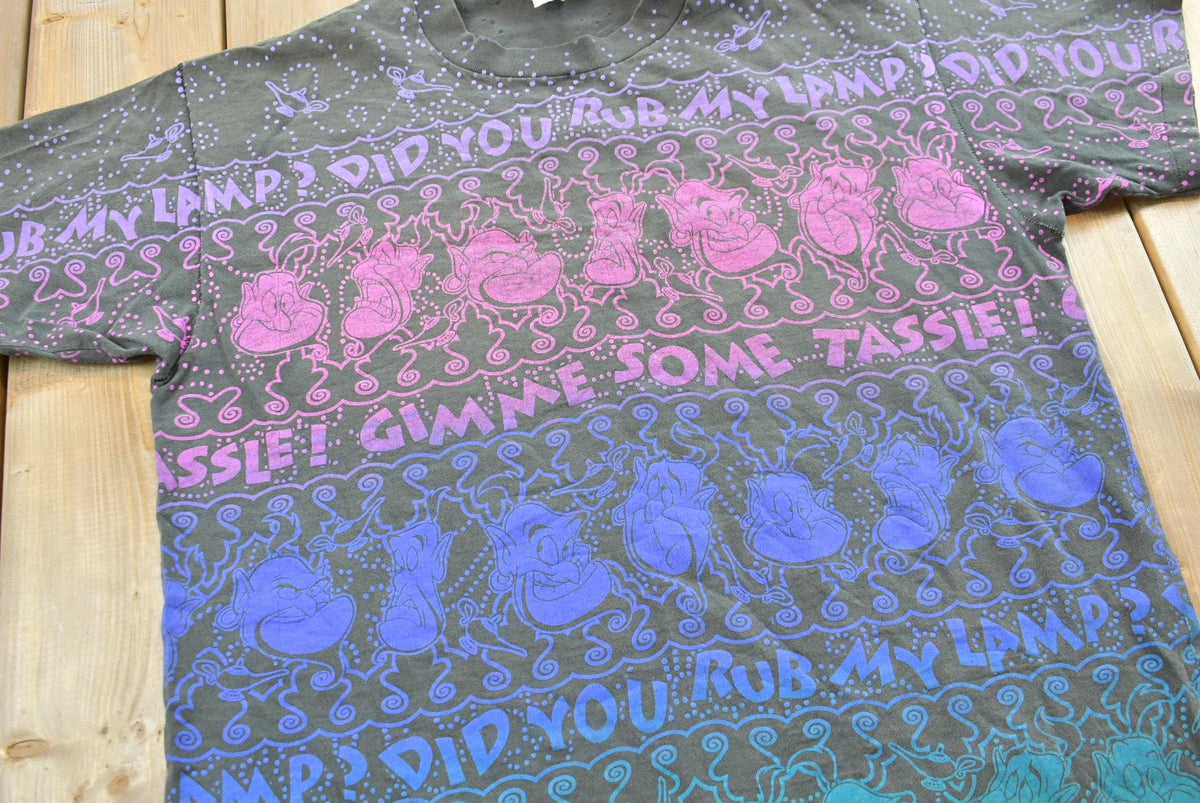 Vintage 1990s Disneys Aladdin AOP Genie T-Shirt Mens Men's Large from propervintagecanada