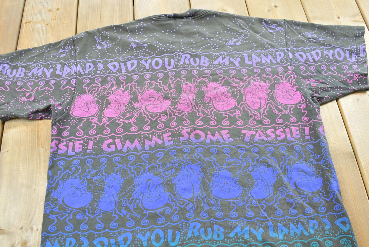Vintage 1990s Disneys Aladdin AOP Genie T-Shirt Mens Men's Large from propervintagecanada