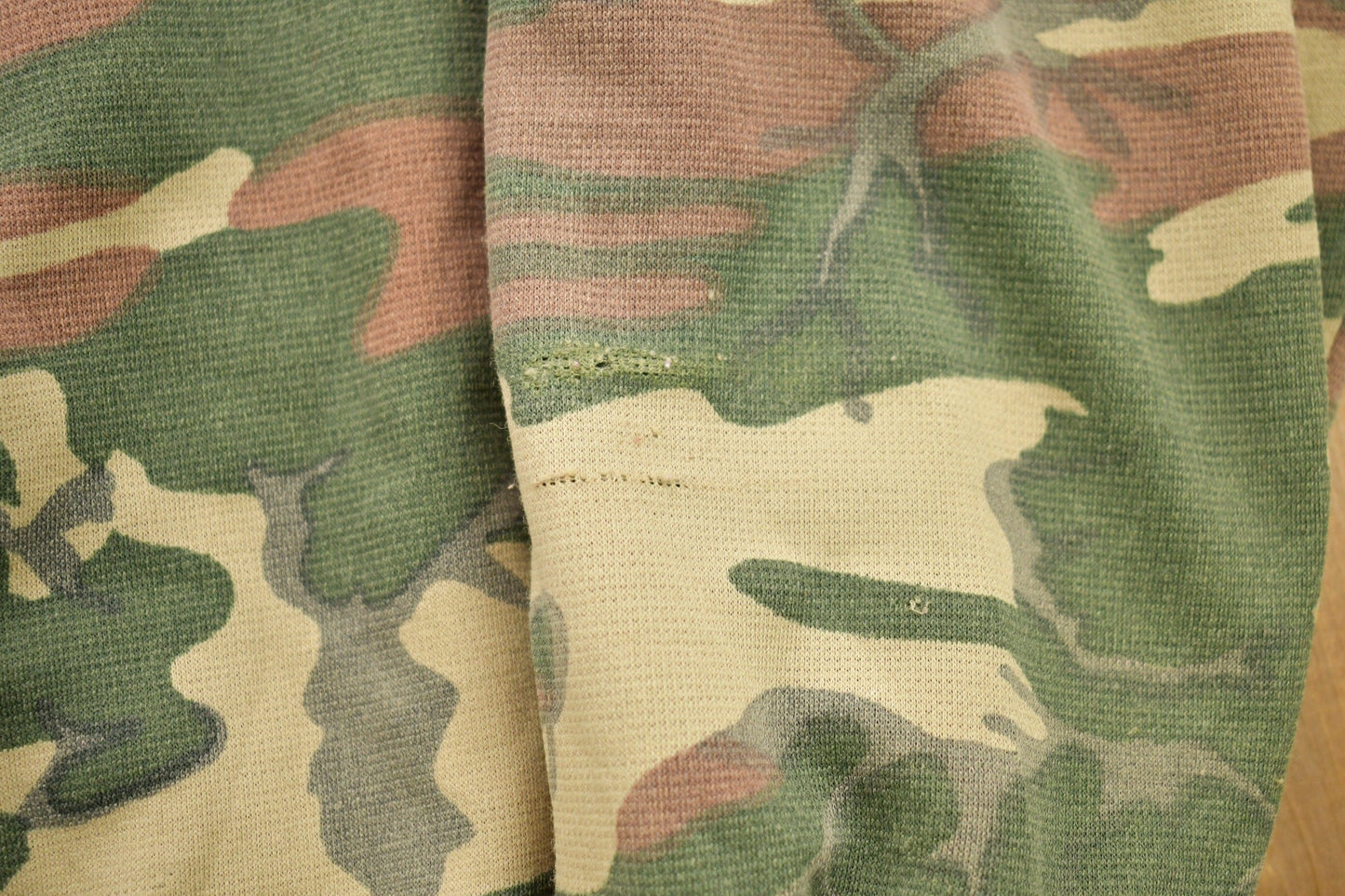 Vintage 1990s Distressed Camouflage Zip Up Hoodie Men's Small from propervintagecanada