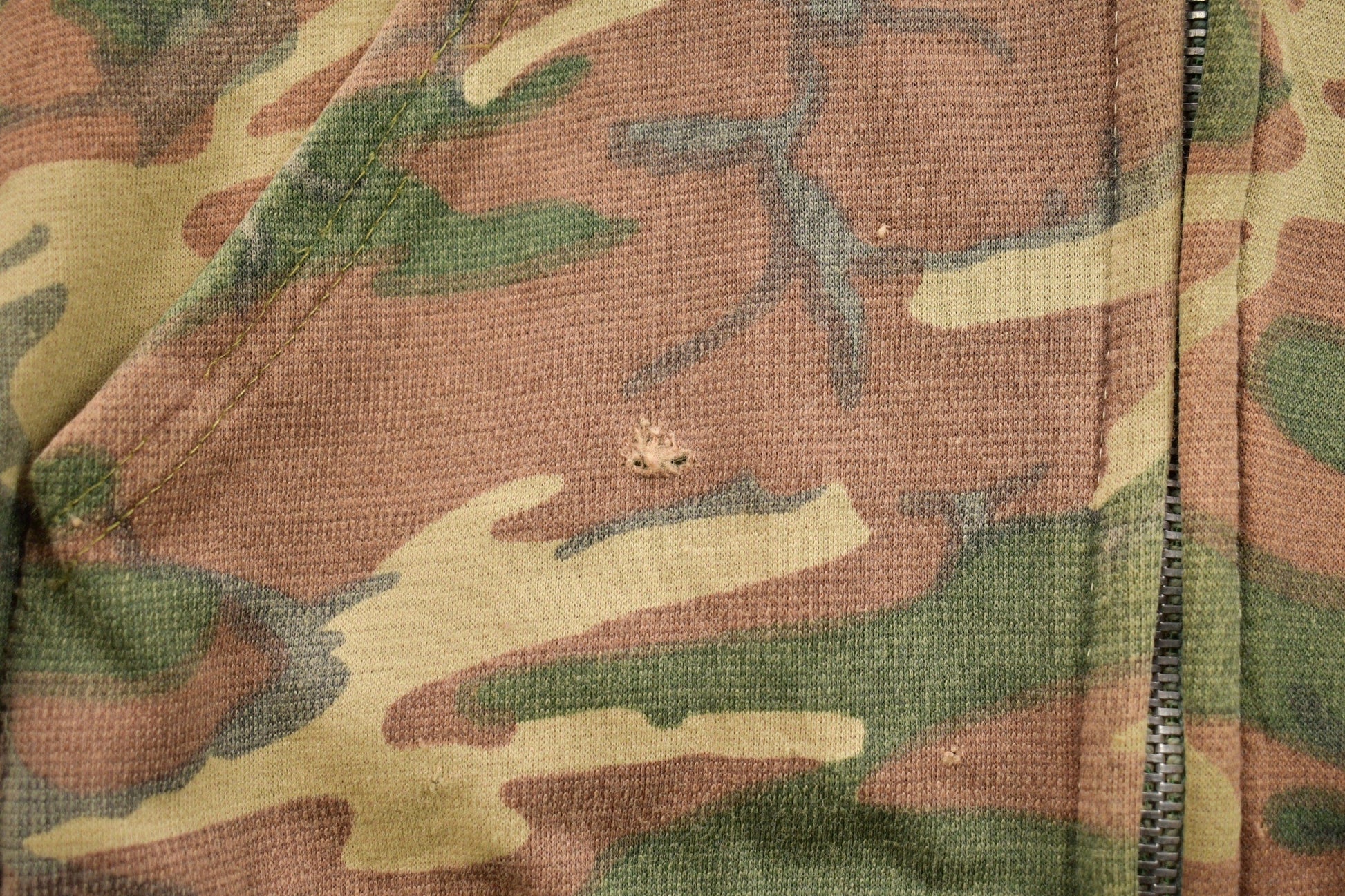 Vintage 1990s Distressed Camouflage Zip Up Hoodie Men's Small from propervintagecanada