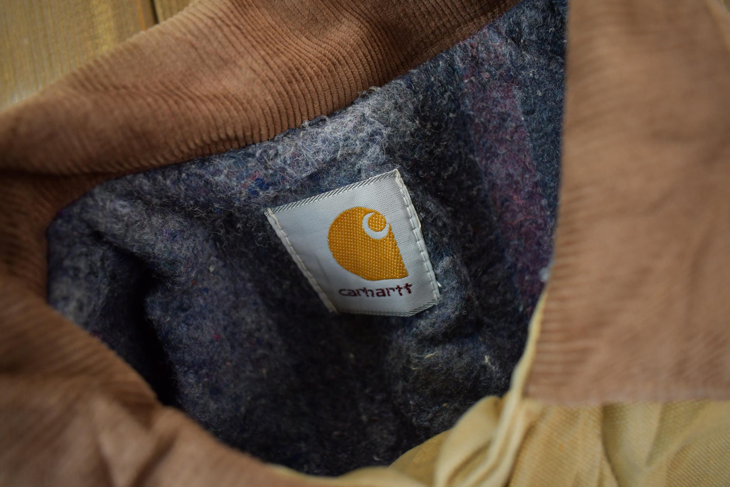 Vintage 1990s Distressed Carhartt Blanket Lined Button Down Jacket Men's L from propervintagecanada
