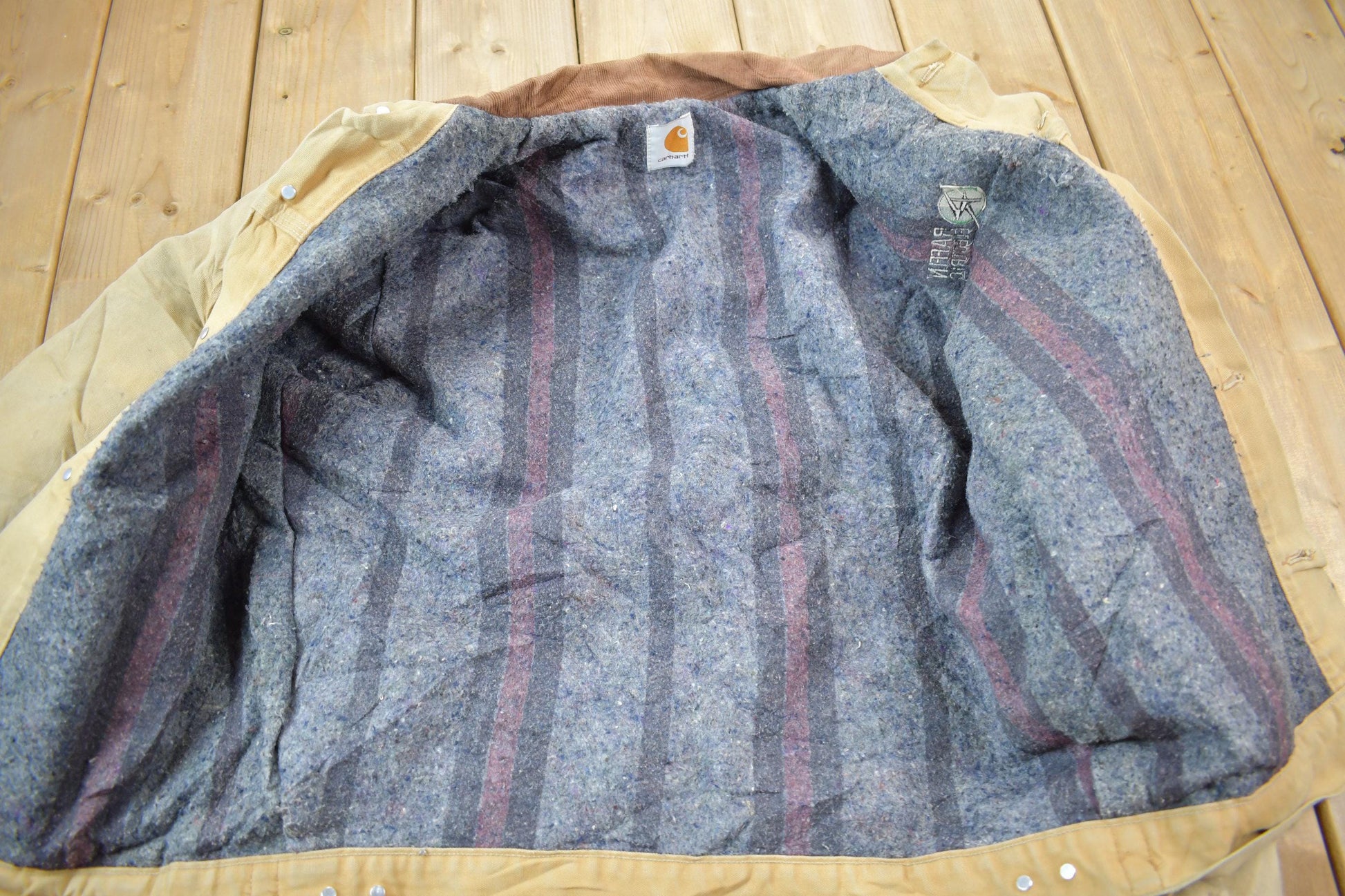 Vintage 1990s Distressed Carhartt Blanket Lined Button Down Jacket Men's L from propervintagecanada