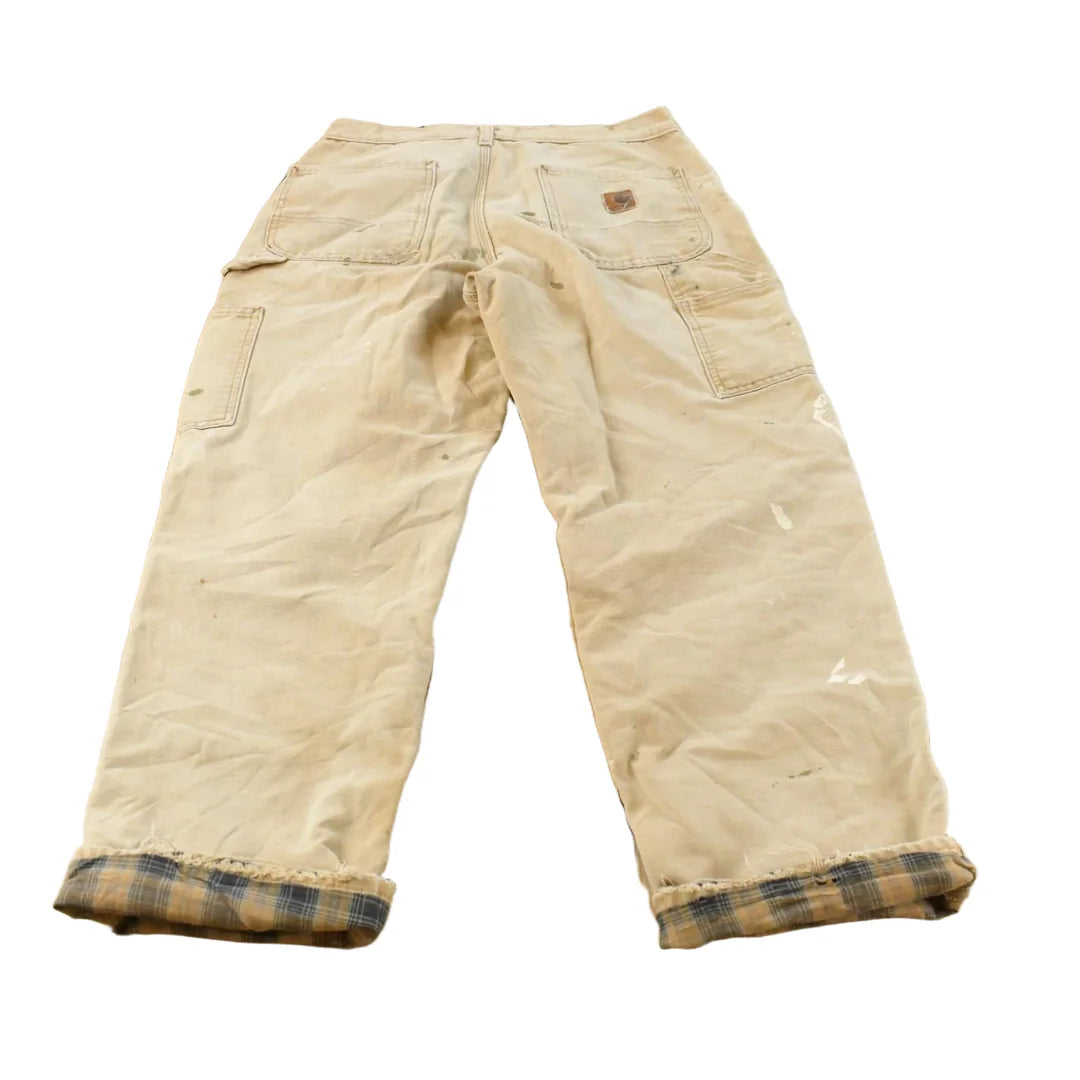 Vintage 1990s Distressed Carhartt Lined Canvas Work Pants Men's 28 x 28 from propervintagecanada