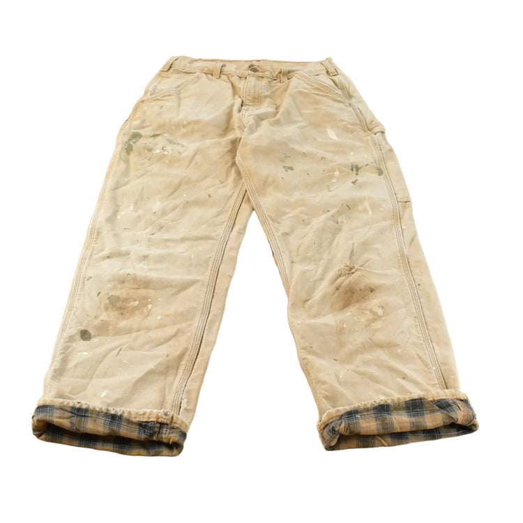 Vintage 1990s Distressed Carhartt Lined Canvas Work Pants Men's 28 x 28 from propervintagecanada