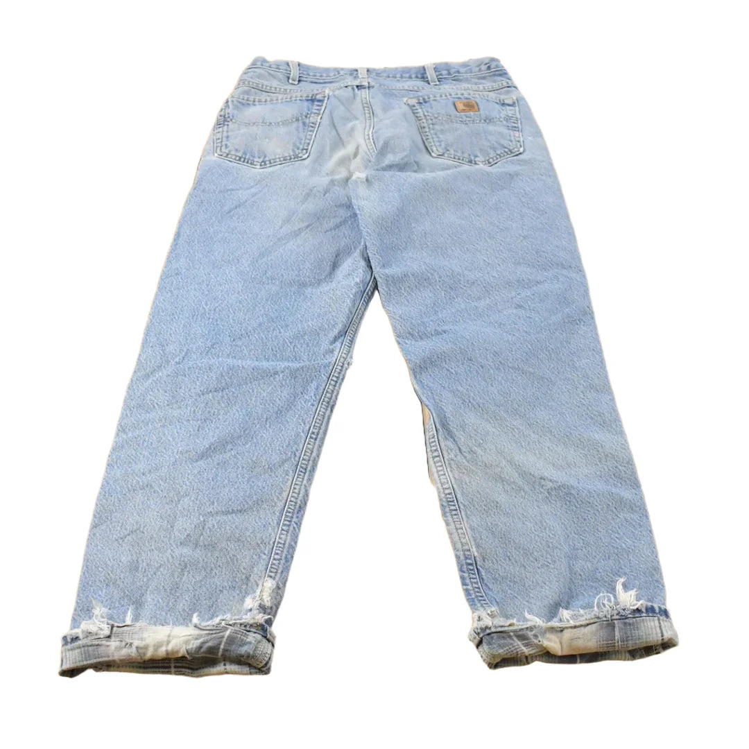 Vintage 1990s Distressed Carhartt Lined Denim Jeans Men's 32 x 31 from propervintagecanada