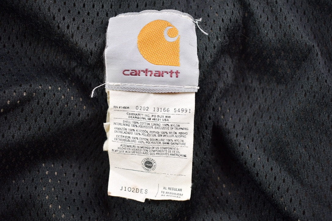 Vintage 1990s Distressed Carhartt Santa Fe Canvas Jacket Men's Large from propervintagecanada