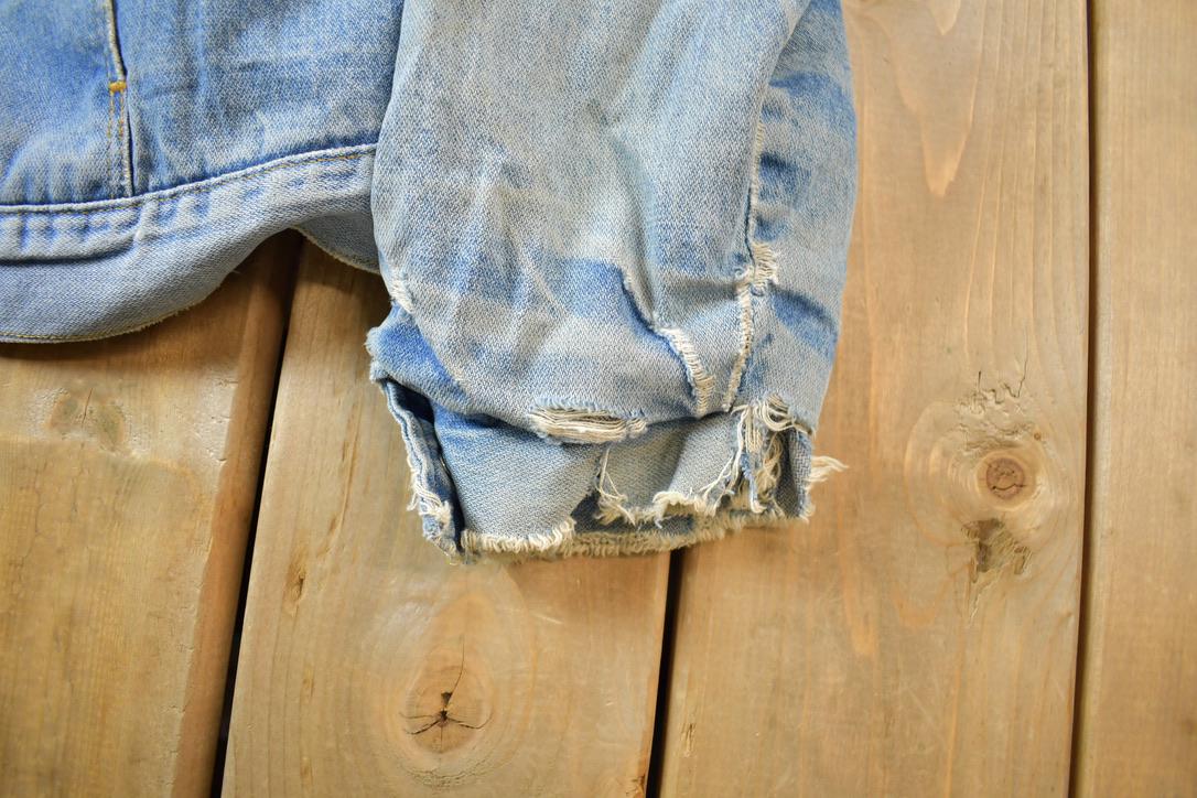 Vintage 1990s Distressed Faded Wrangler Synthetic Fur Lined Jean Jacket from propervintagecanada