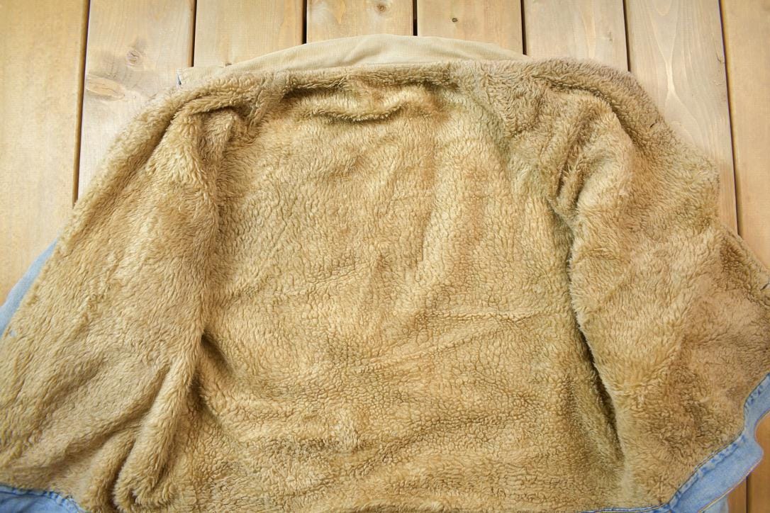 Vintage 1990s Distressed Faded Wrangler Synthetic Fur Lined Jean Jacket from propervintagecanada