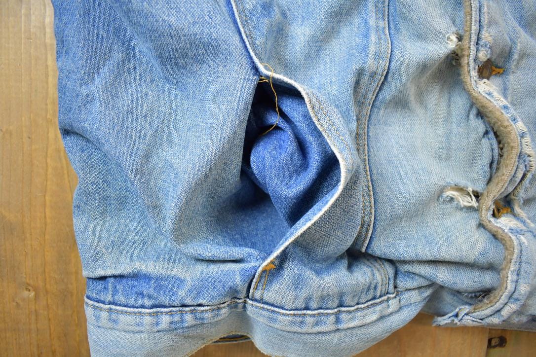Vintage 1990s Distressed Faded Wrangler Synthetic Fur Lined Jean Jacket from propervintagecanada