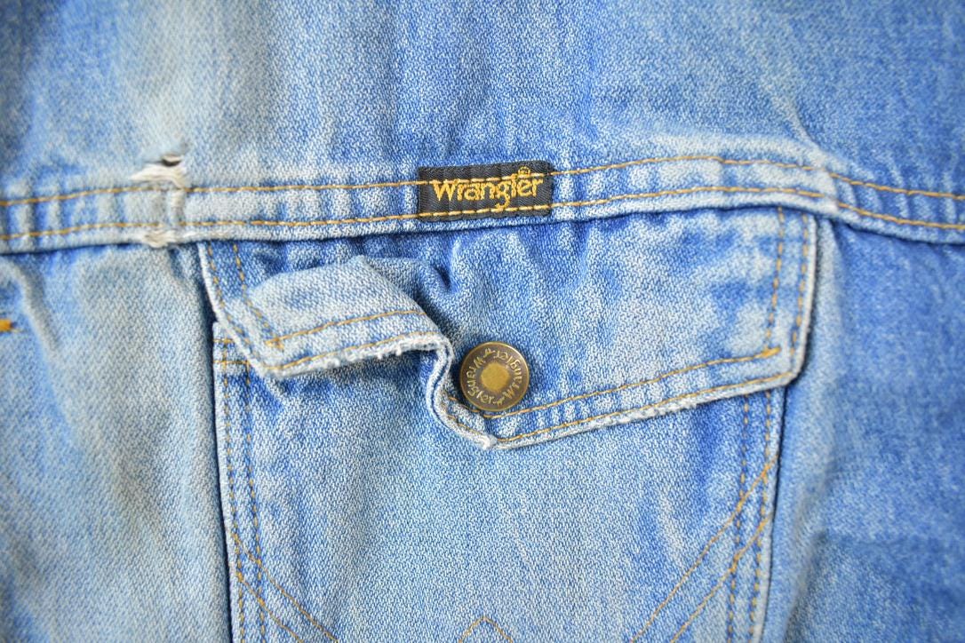 Vintage 1990s Distressed Faded Wrangler Synthetic Fur Lined Jean Jacket from propervintagecanada
