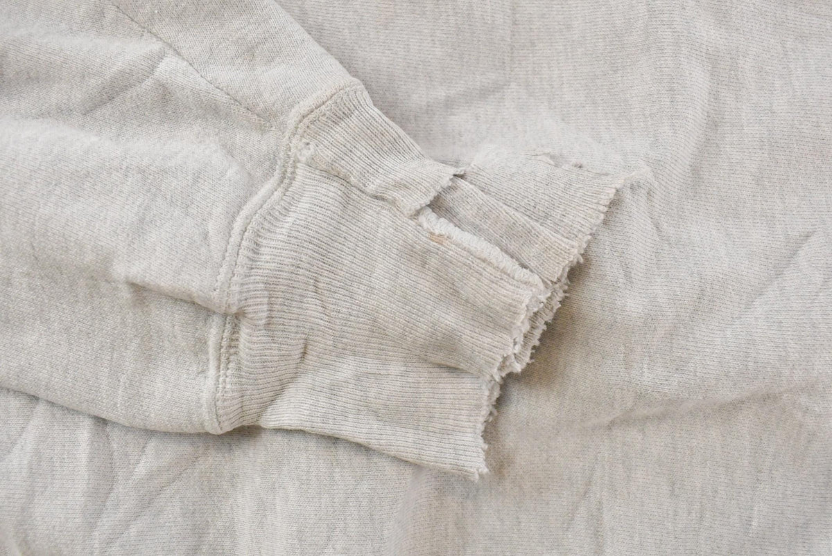 Vintage 1990s Distressed Good Counsel Champion Reverse Weave Crewneck Sweatshirt Men's L from propervintagecanada