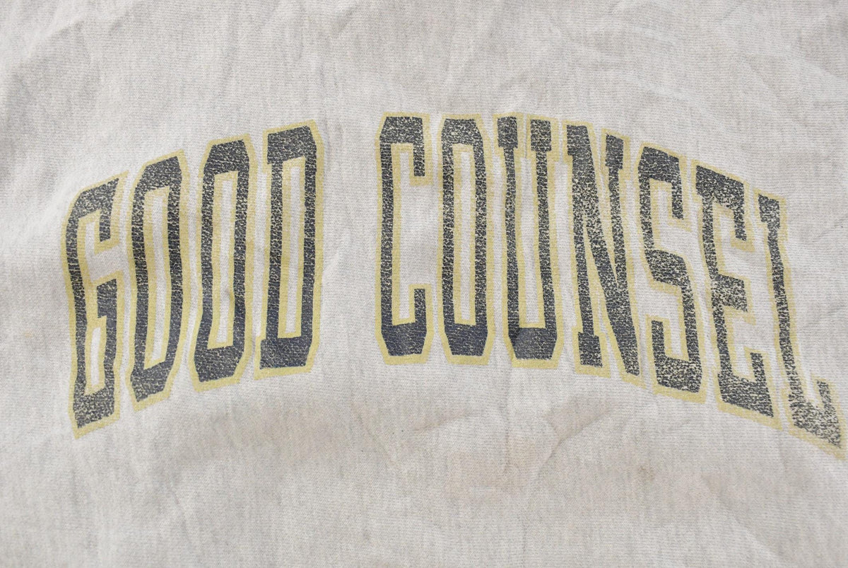 Vintage 1990s Distressed Good Counsel Champion Reverse Weave Crewneck Sweatshirt Men's L from propervintagecanada