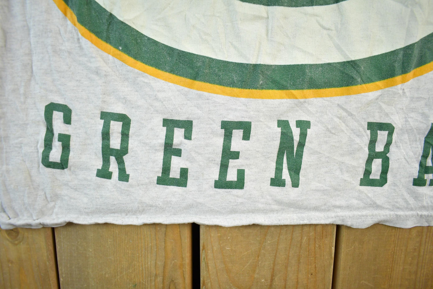 Vintage 1990s Distressed Green Bay Packers NFL Graphic T Shirt Men's XL from propervintagecanada