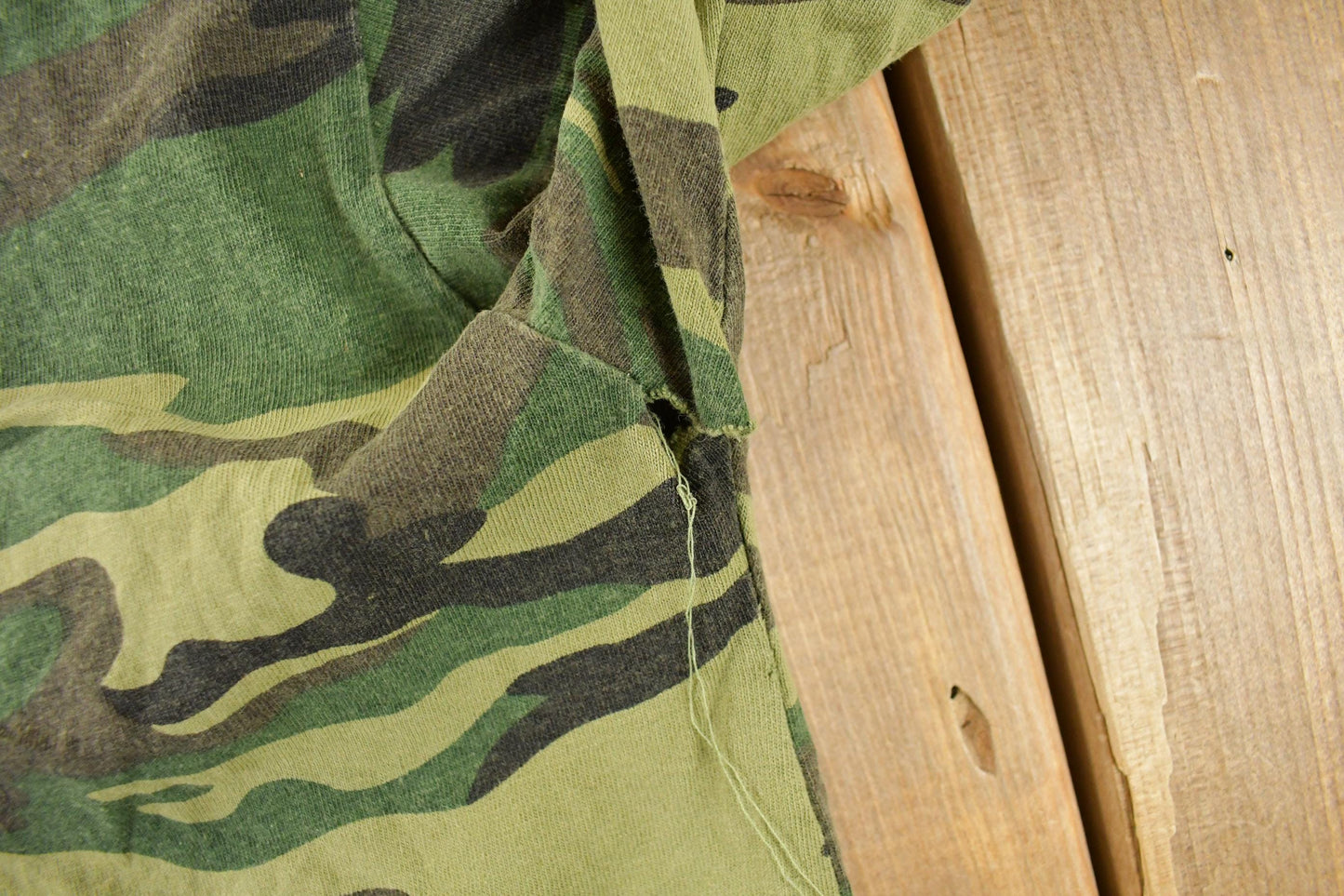 Vintage 1990s Distressed Woodland Camo T-Shirt Men's Large from propervintagecanada