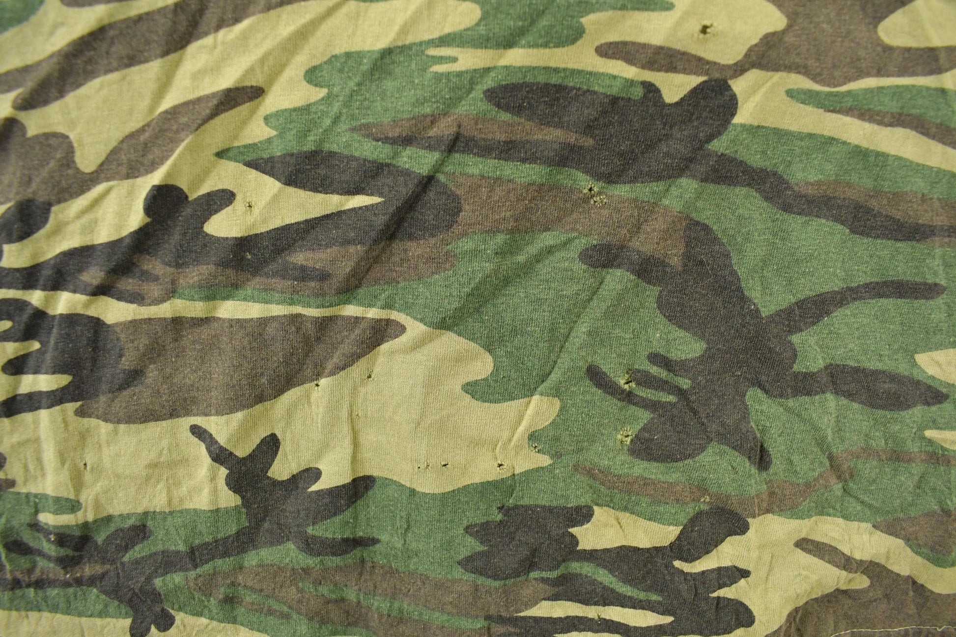 Vintage 1990s Distressed Woodland Camo T-Shirt Men's Large from propervintagecanada
