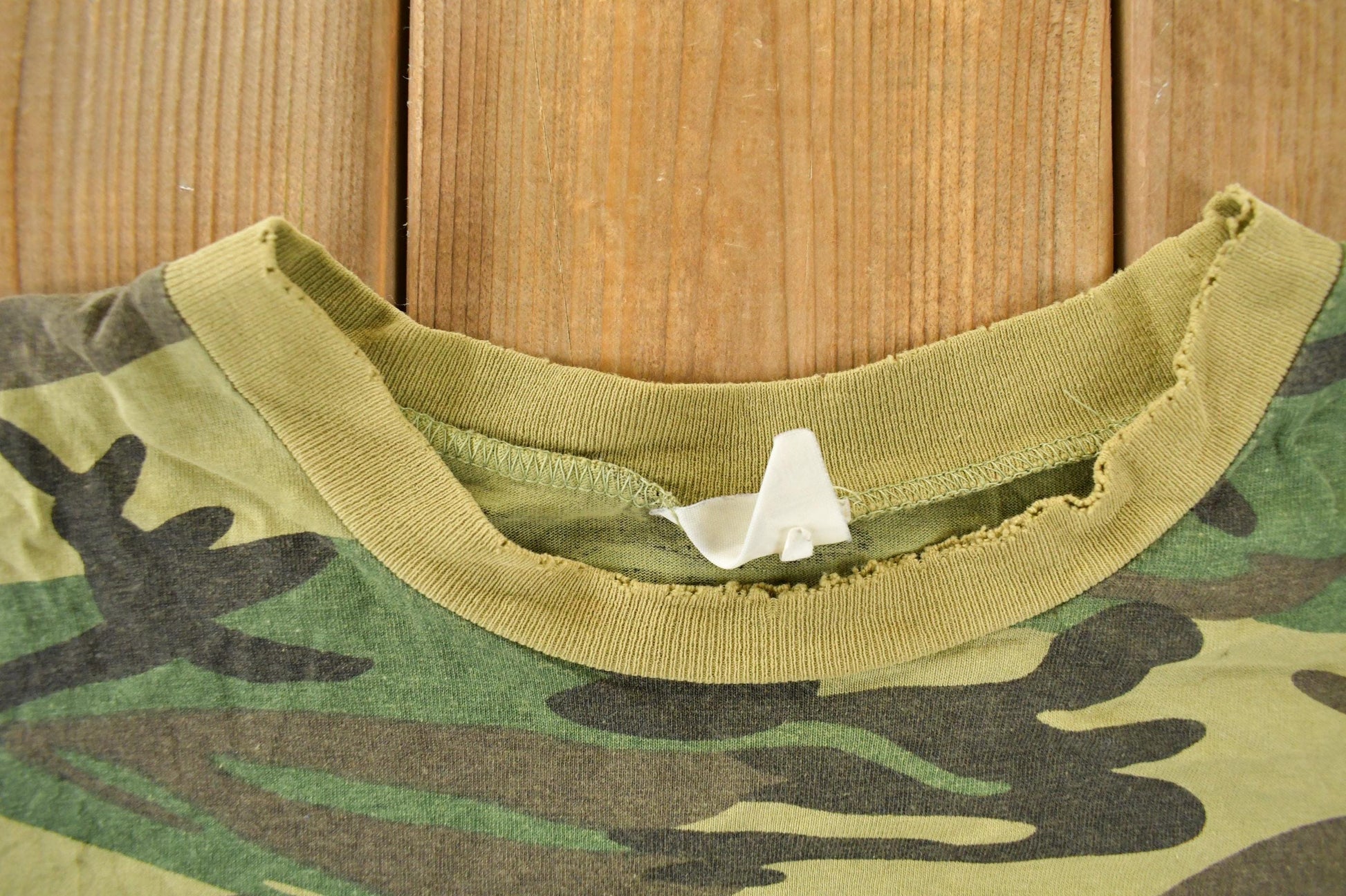 Vintage 1990s Distressed Woodland Camo T-Shirt Men's Large from propervintagecanada