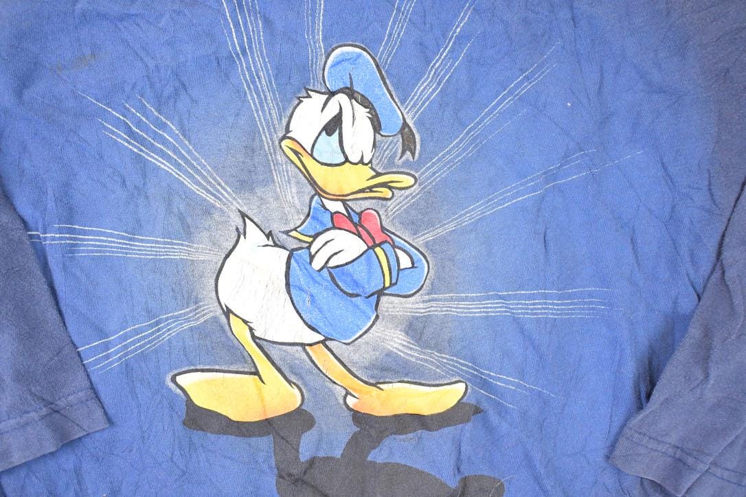 Vintage 1990s Donald Duck Graphic Print Disney Long Sleeve T Shirt Men's L from propervintagecanada