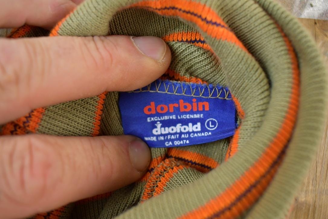 Vintage 1990s Dorbin Striped Souvenir Single Stitch Graphic Print Turtleneck Shirt Women's S from propervintagecanada
