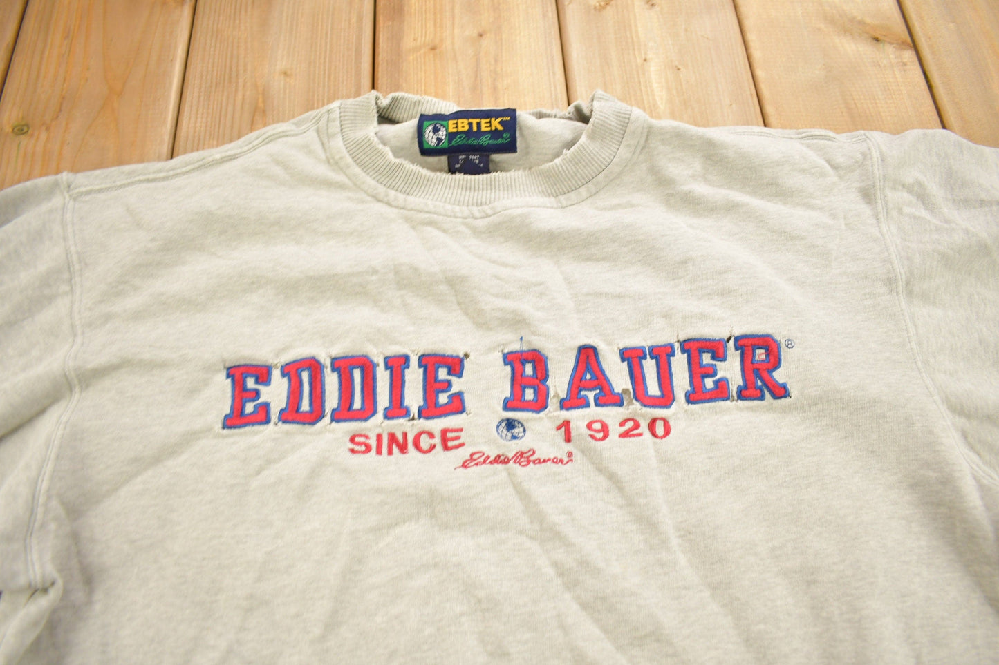 Vintage 1990s Eddie Bauer EBTEK Distressed Crewneck Sweatshirt Men's Medium from propervintagecanada
