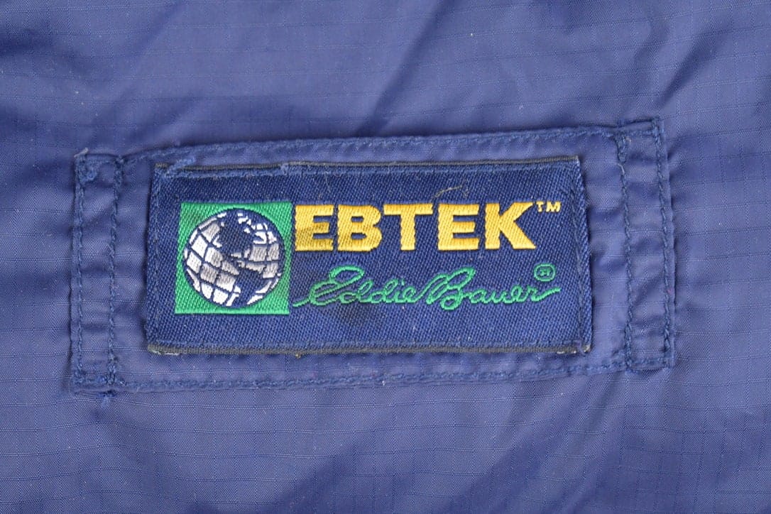 Vintage 1990s Eddie Bauer EBTEK Goose Down Reversible Puffer Vest Men's Large from propervintagecanada
