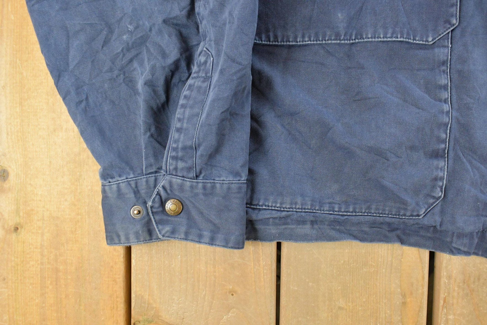 Vintage 1990s Eddie Bauer Sun Faded Field Jacket Men's Large from propervintagecanada