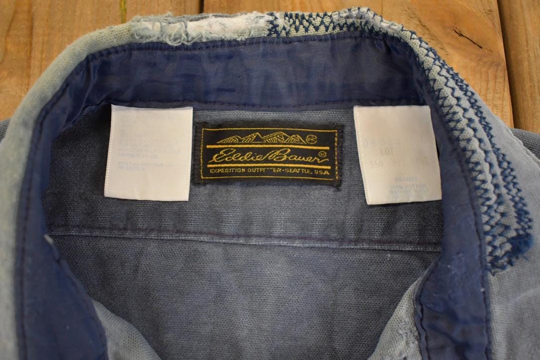 Vintage 1990s Eddie Bauer Thrashed Denim Button Up Shirt Men's L from propervintagecanada
