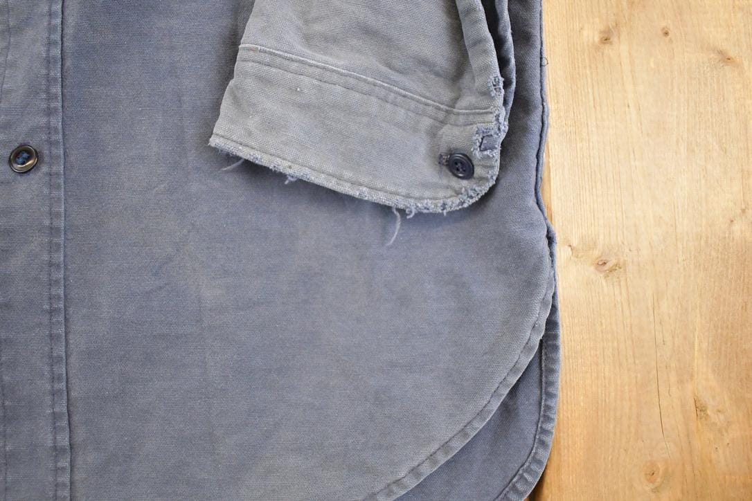 Vintage 1990s Eddie Bauer Thrashed Denim Button Up Shirt Men's L from propervintagecanada