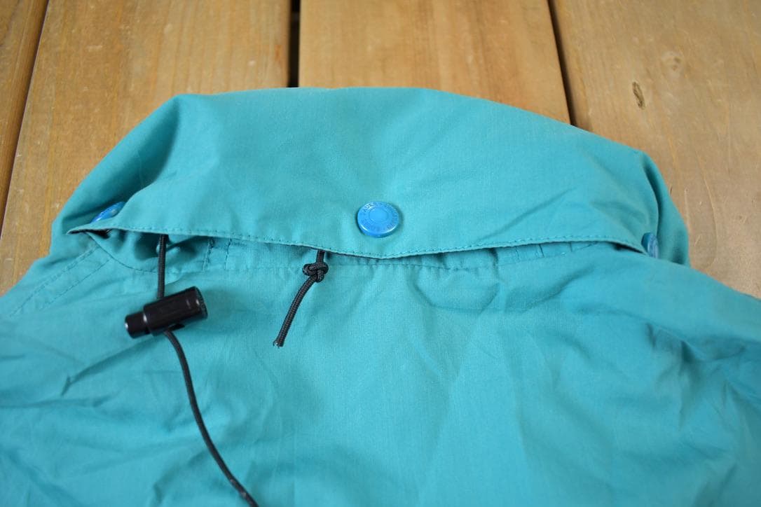 Vintage 1990s Eddie Bauer Windbreaker Retractable Hood Light Jacket Men's M from propervintagecanada