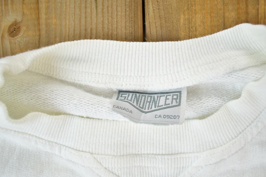 Vintage 1990s Edmonton Elite Hockey AOP Souvenir Crewneck Sweatshirt Made In USA Men's XL from propervintagecanada