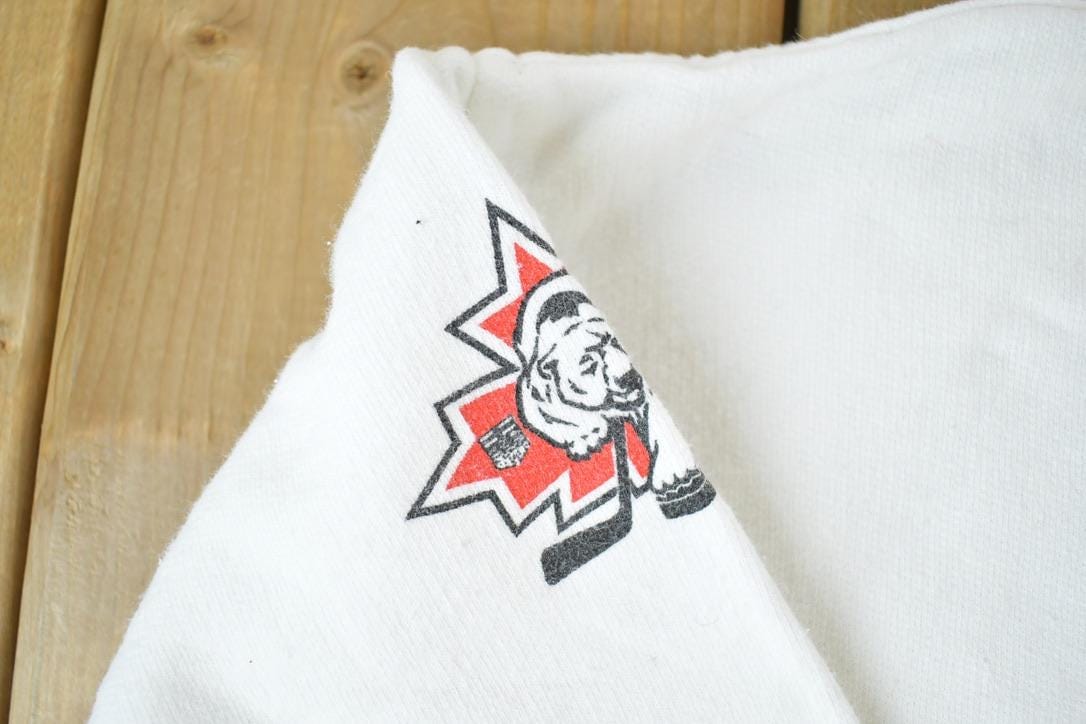 Vintage 1990s Edmonton Elite Hockey AOP Souvenir Crewneck Sweatshirt Made In USA Men's XL from propervintagecanada