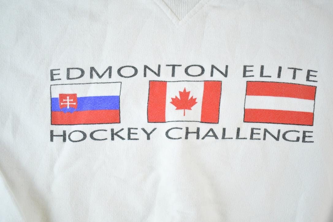 Vintage 1990s Edmonton Elite Hockey AOP Souvenir Crewneck Sweatshirt Made In USA Men's XL from propervintagecanada