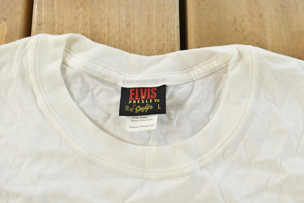 Vintage 1990s Elvis All Over Print Graphic T-Shirt Men's XL Men's Large from propervintagecanada