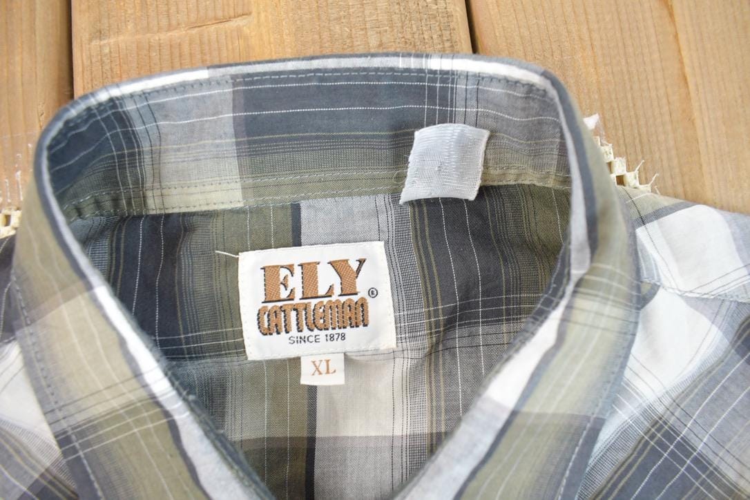 Vintage 1990s Ely Cattleman Western Style Pearl Snap Button Down Flannel Shirt Men's XL from propervintagecanada