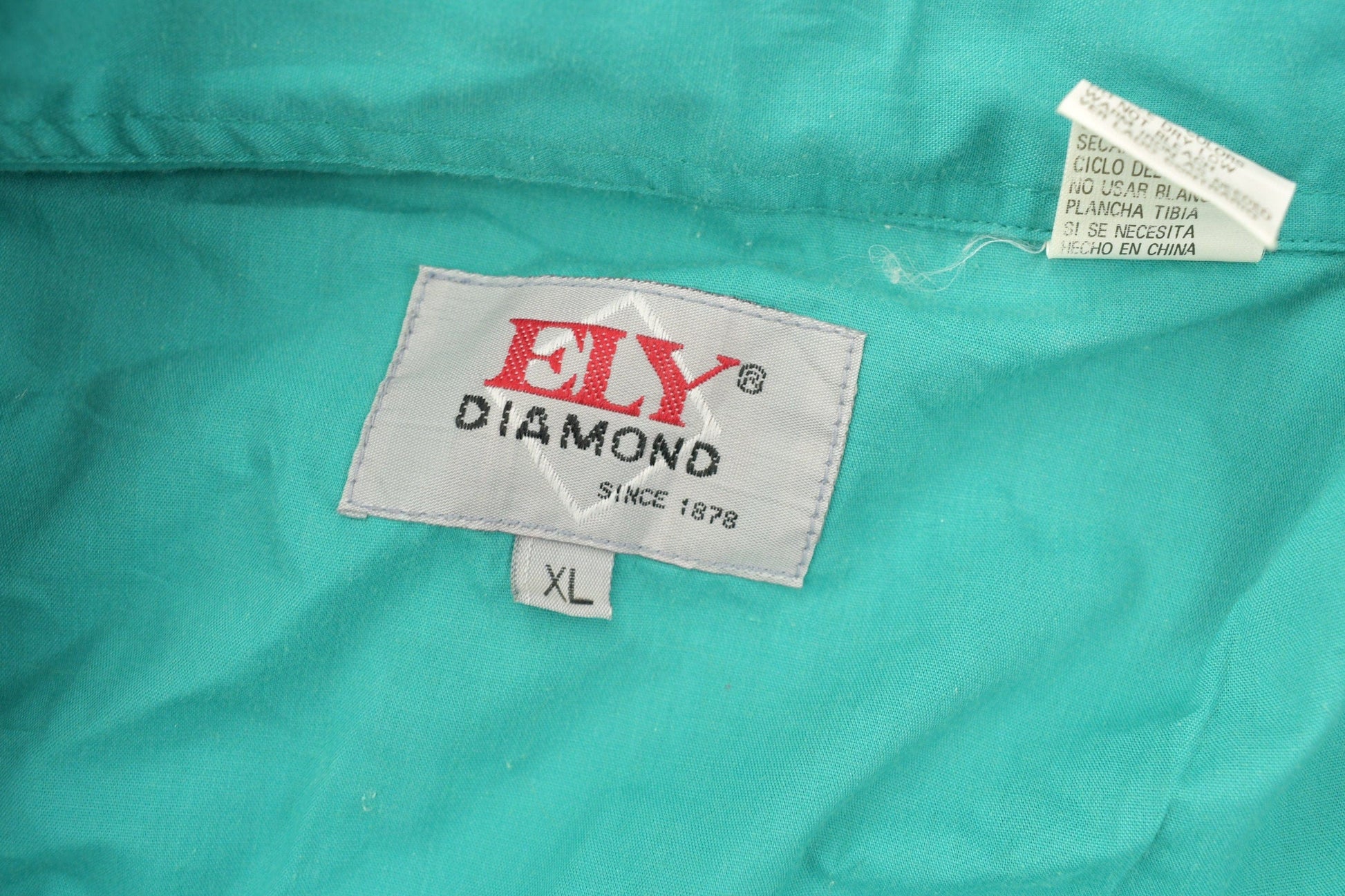 Vintage 1990s Ely Diamond Button Up Western Shirt Men's 2XL from propervintagecanada
