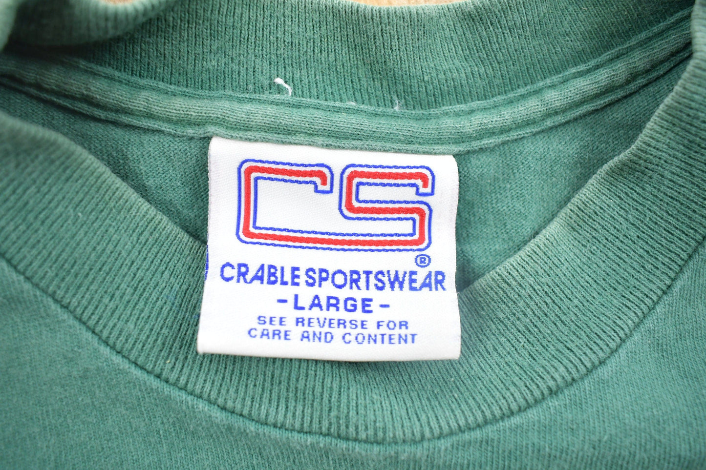 Vintage 1990s Embroidered Green Bay Packers World Champ 1965 NFL Graphic T-Shirt Men's Large from propervintagecanada