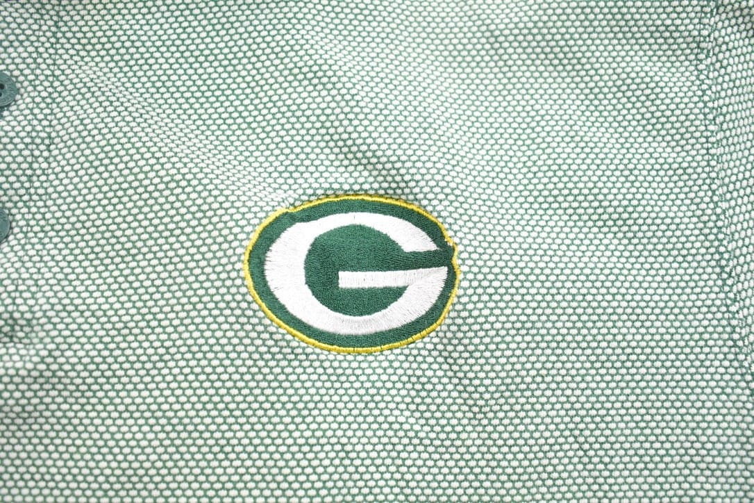 Vintage 1990s Embroidered Pro Line Green Bay Packers NFL Button Up Collar T-Shirt Men's XL from propervintagecanada