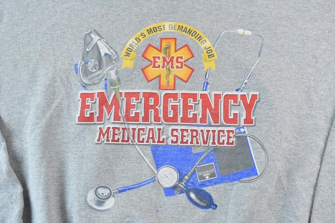 Vintage 1990s EMS Souvenir Crewneck Sweatshirt Men's XL from propervintagecanada