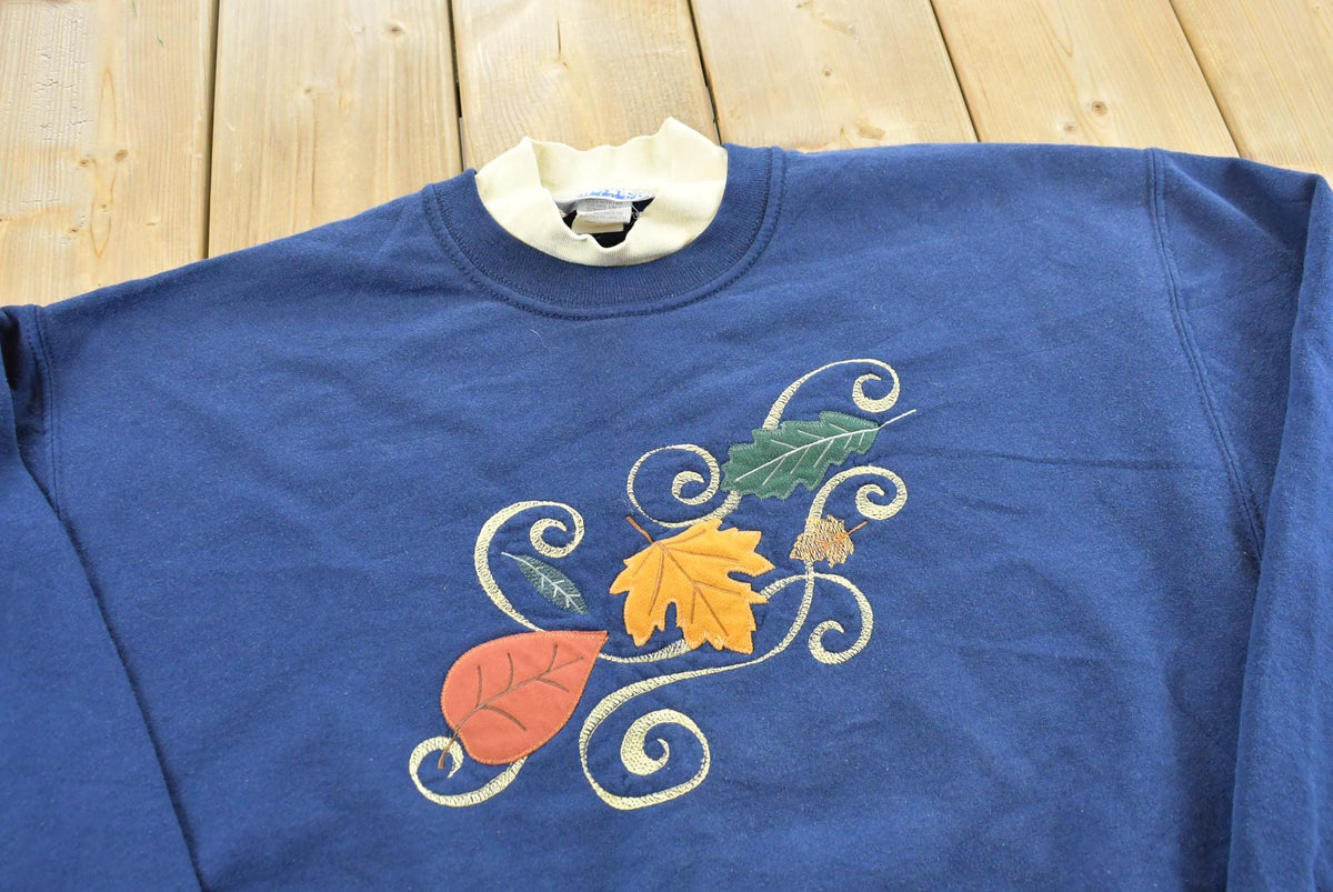 Vintage 1990s Endless Designs Leaf Graphic Crewneck Sweatshirt Men's L from propervintagecanada
