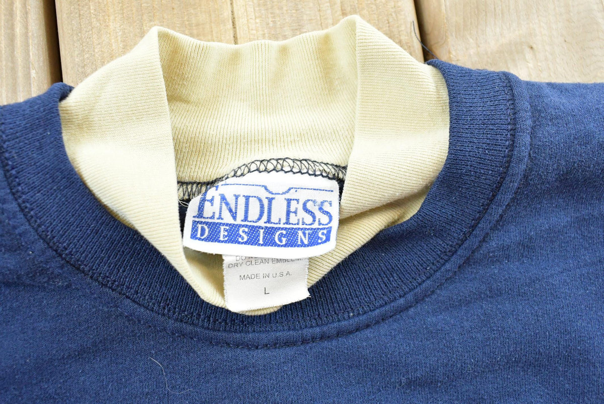 Vintage 1990s Endless Designs Leaf Graphic Crewneck Sweatshirt Men's L from propervintagecanada