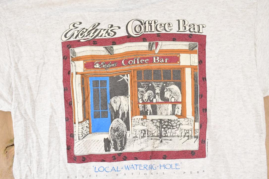 Vintage 1990s Evelyn's Coffee Bar Souvenir Travel T-Shirt Men's L from propervintagecanada