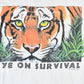 Vintage 1990s Eyes on Survival Realistic Tiger Theme Single Stitch Graphic T-Shirt Men's XS from propervintagecanada