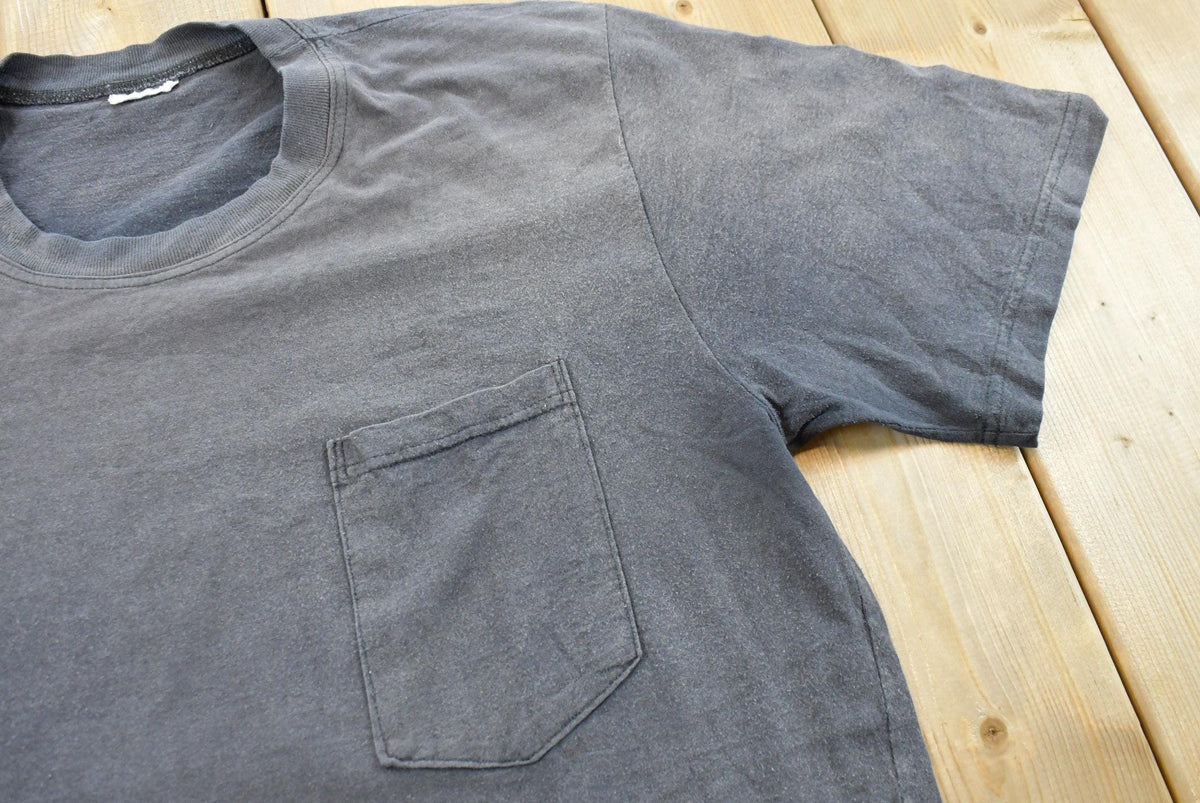 Vintage 1990s Faded Blank Black Pocket T-Shirt Men's L from propervintagecanada