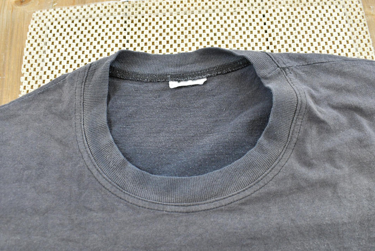 Vintage 1990s Faded Blank Black Pocket T-Shirt Men's L from propervintagecanada